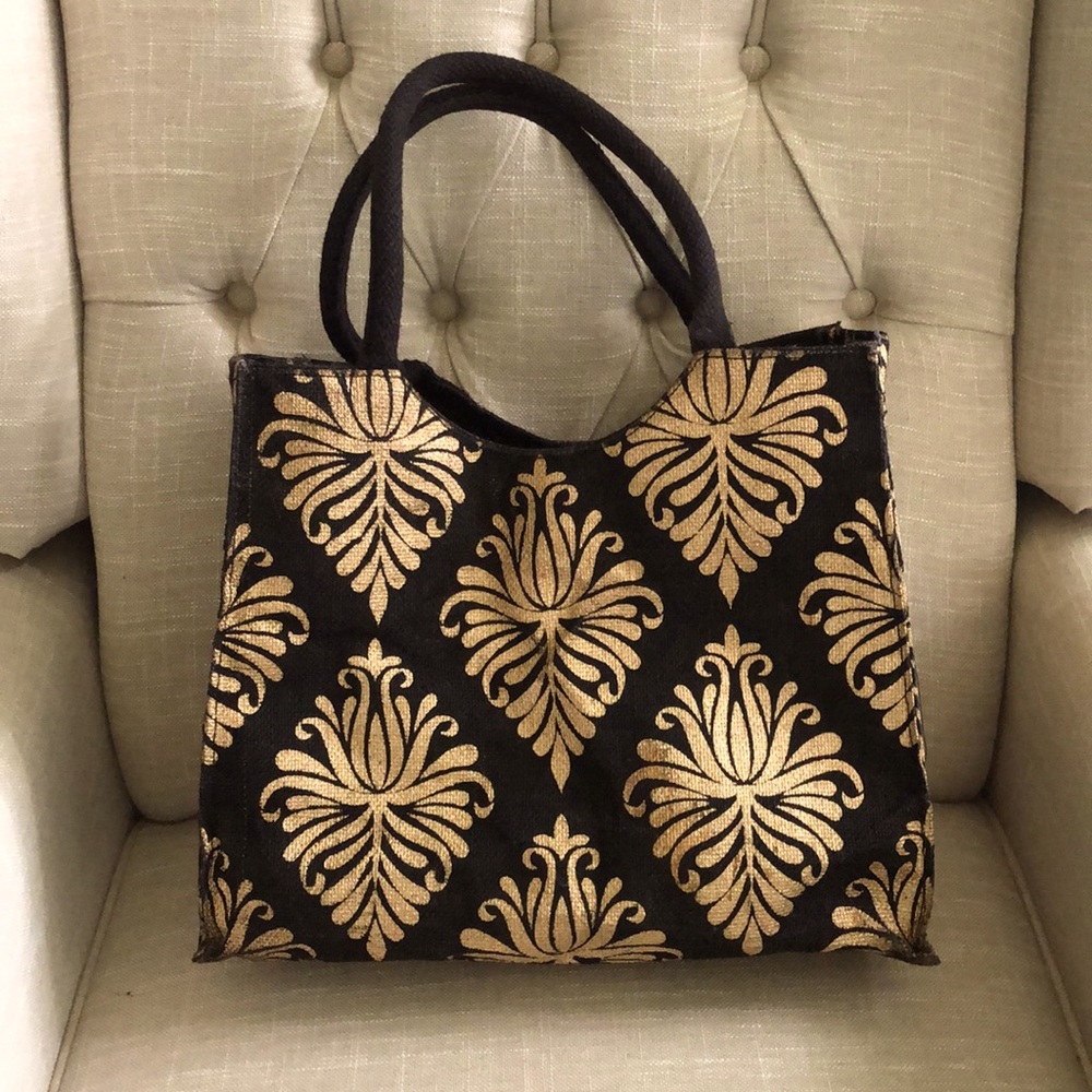 Black and gold tote bag.